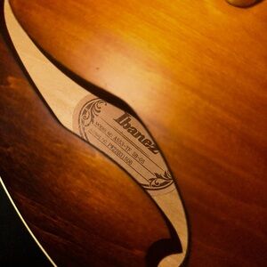 Brown Acoustic Guitar